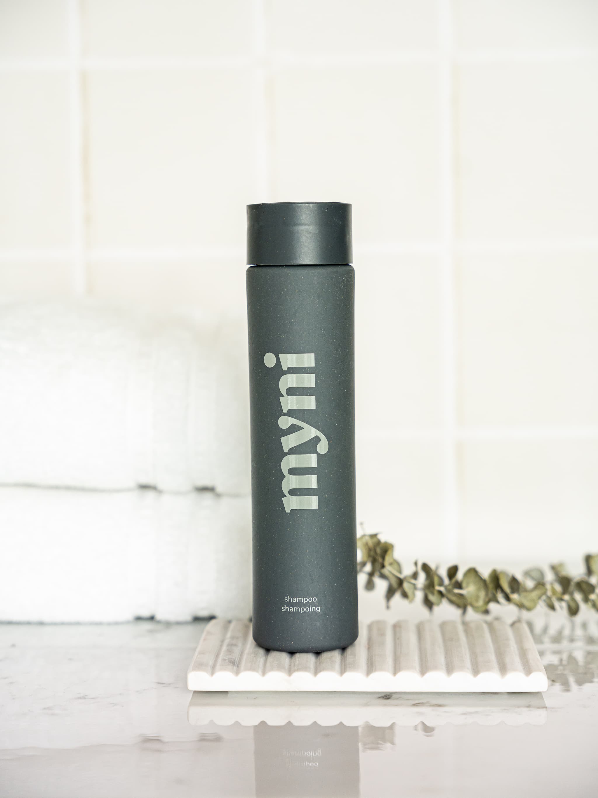 black shampoo wheat straw bottle