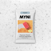 Myni degreaser cleaner packet on a textured white background