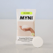 MYNI foaming hand soap bar with packaging on a light gray background