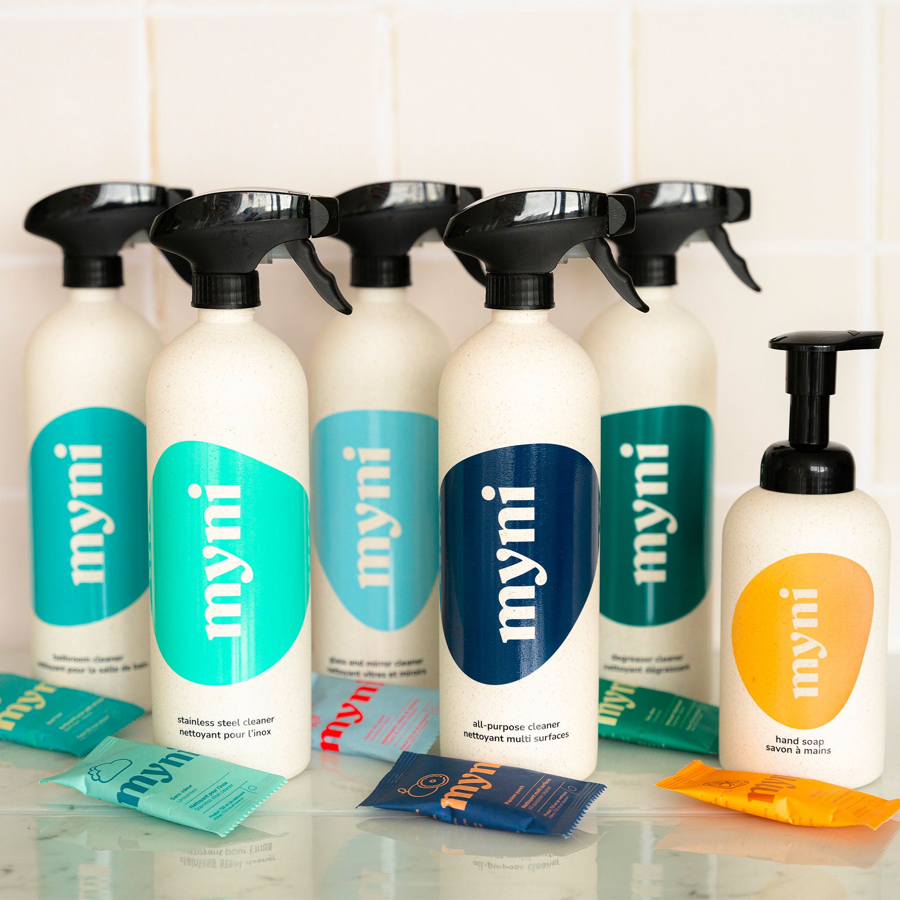 myni eco-friendly and non-toxic complete set with 6 cleaning bottles and tablet refills orange hand soap bottle