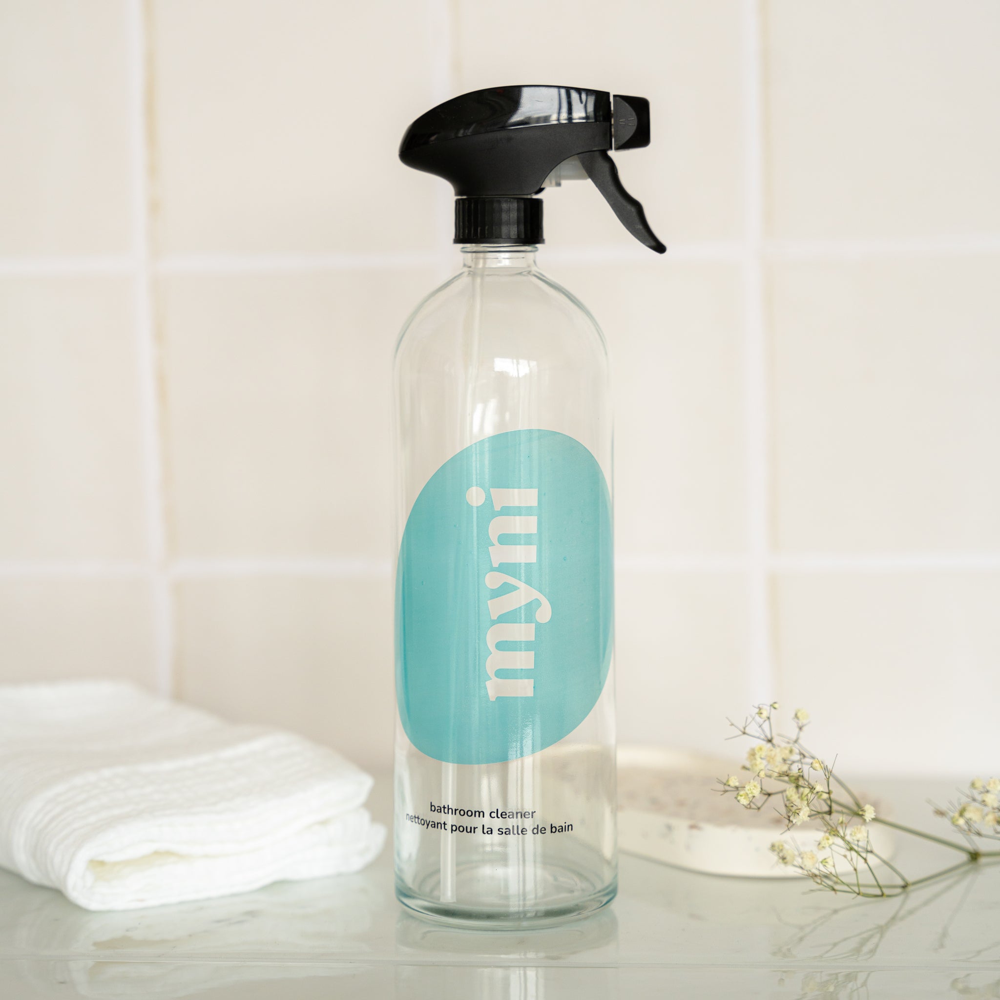 bathroom cleaner bottle in glass